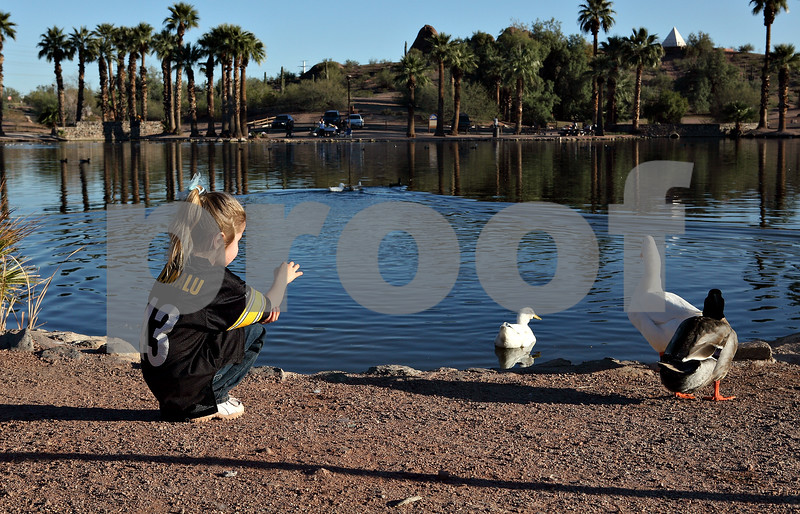 IMAGE: http://ksnyderphoto.smugmug.com/Family/Papago-Fun-09/IMG1161-4x7/466561221_bRn2D-L-1.jpg